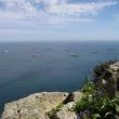 Foto vanaf de Rots van Gibraltar. Schepen liggen van beide kanten in de windrichting om de rots