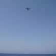 Een vliegtuig van Lampedusa Coastguard neemt poolshoogte