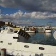 Halfgezonken vissersboot in Marsaxlokk
