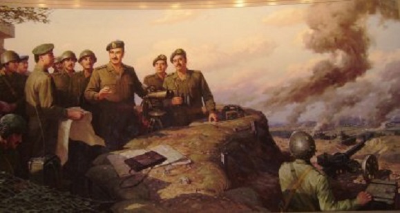 President Hafez al-Assad geeft instructies over zijn plannen bij aanval op de Hoogten van Golan in 1973. Schilderij in het Tishreen War Panorama, Damascus