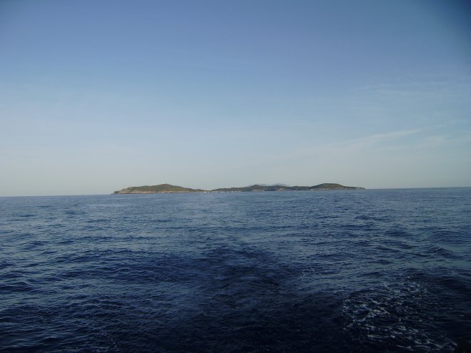 Het kleine Isola di Giannutri verdwijnt aan de horizon