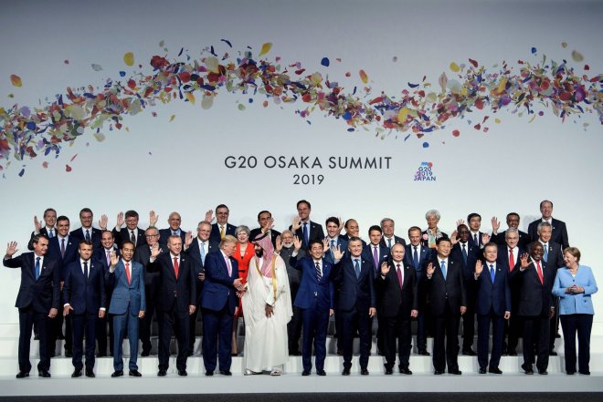 Officiëé groepsfoto van de G20 in Osaka (foto AFP)