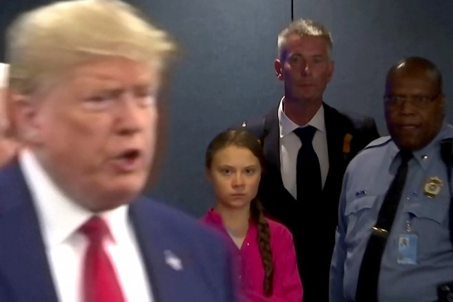Trump en Greta Thunberg op de VN-klimaatconferentie in New York. Hij negeert haar en blijft slechts een kwartier. (foto: Reuters)